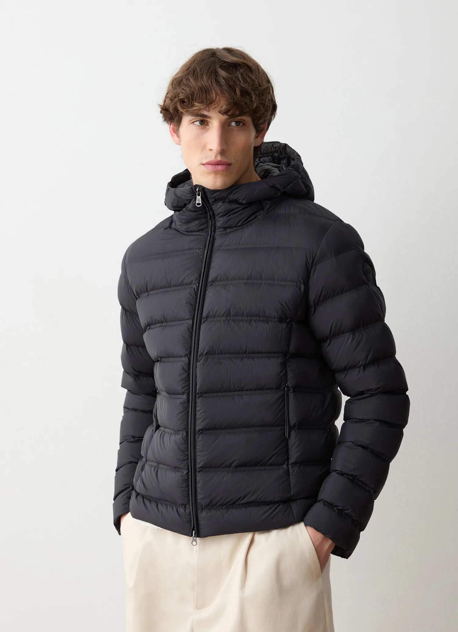 Down jacket with seamless quilting-